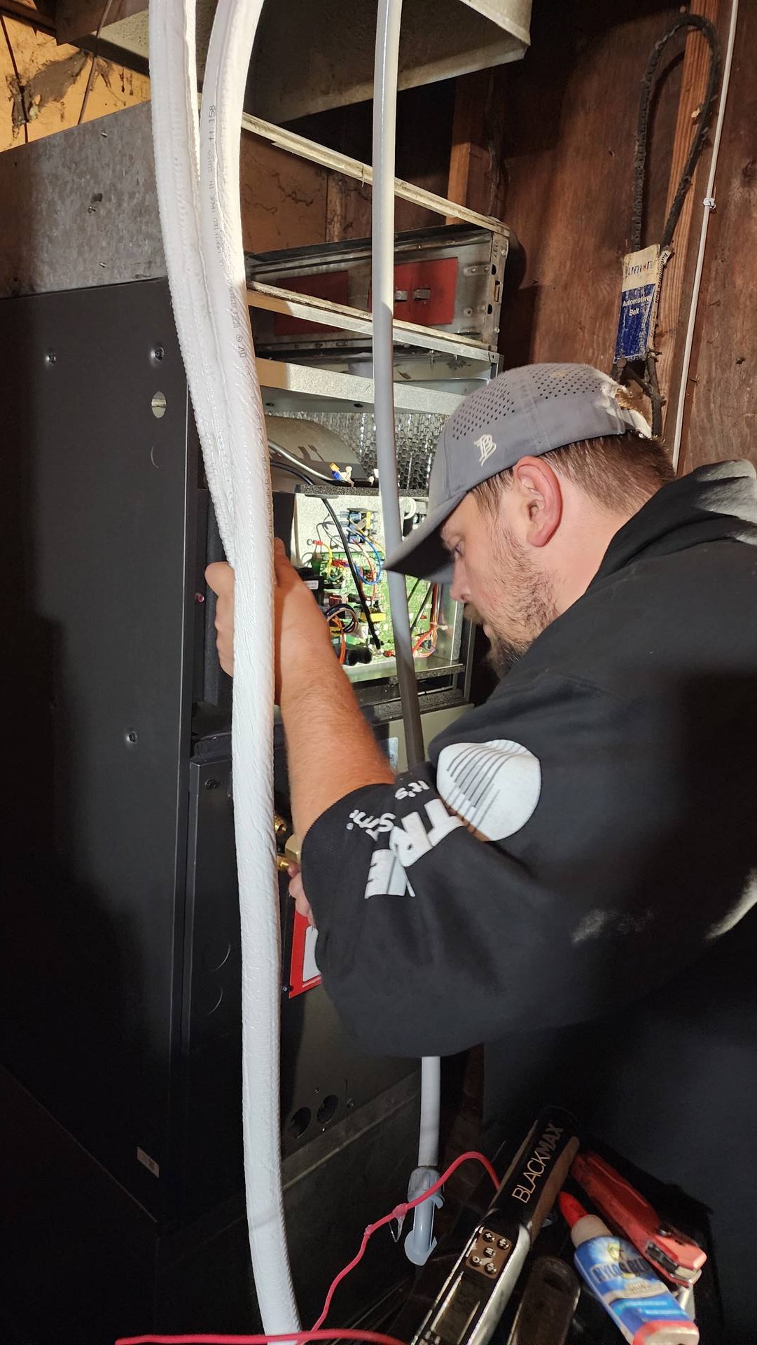 Technician performing preventive maintenance